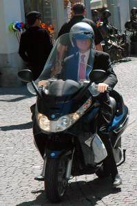 Businessman on Scooter.flickrCC.JochenFrey