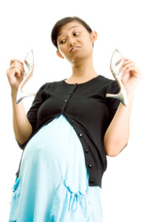pregnant woman and high heel shoes