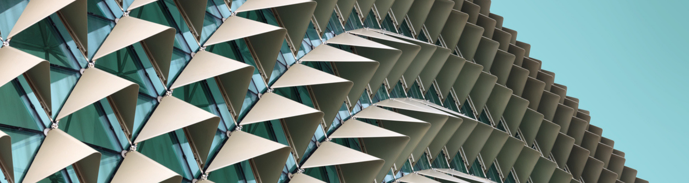 Abstract close-up view of modern aluminum ventilated facade of triangles