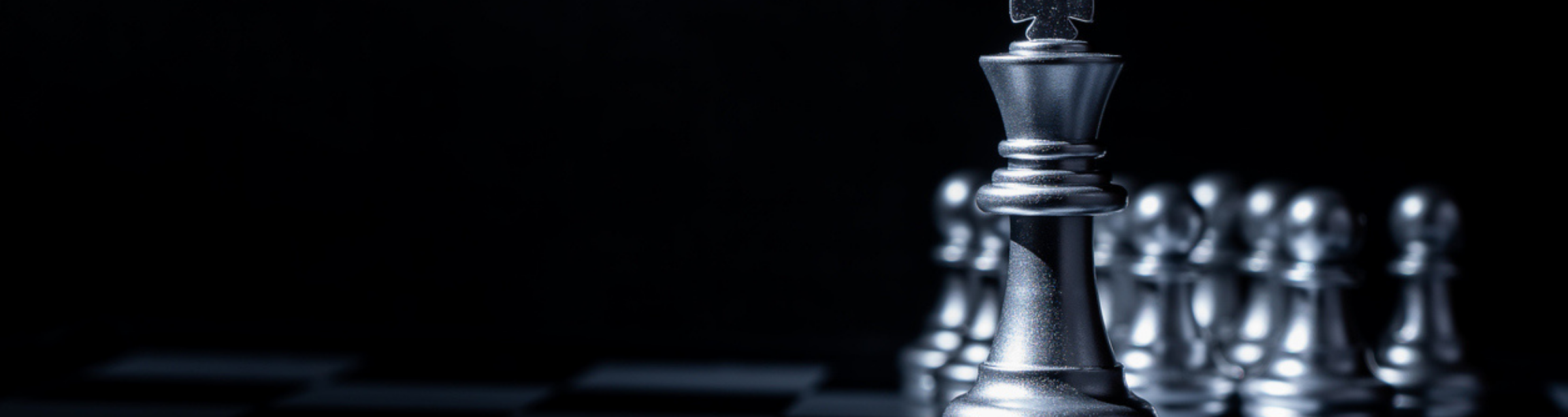 Chess board game for business concept in light and shadow.