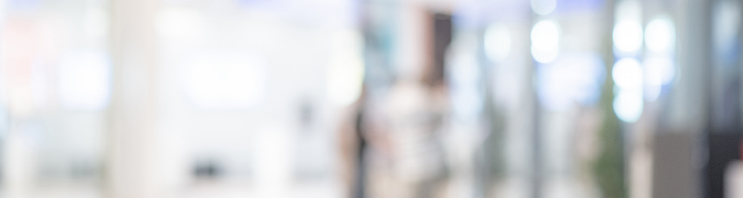 Abstract blurred shopping mall or department store. Blur hall interior space. Defocused public building background.