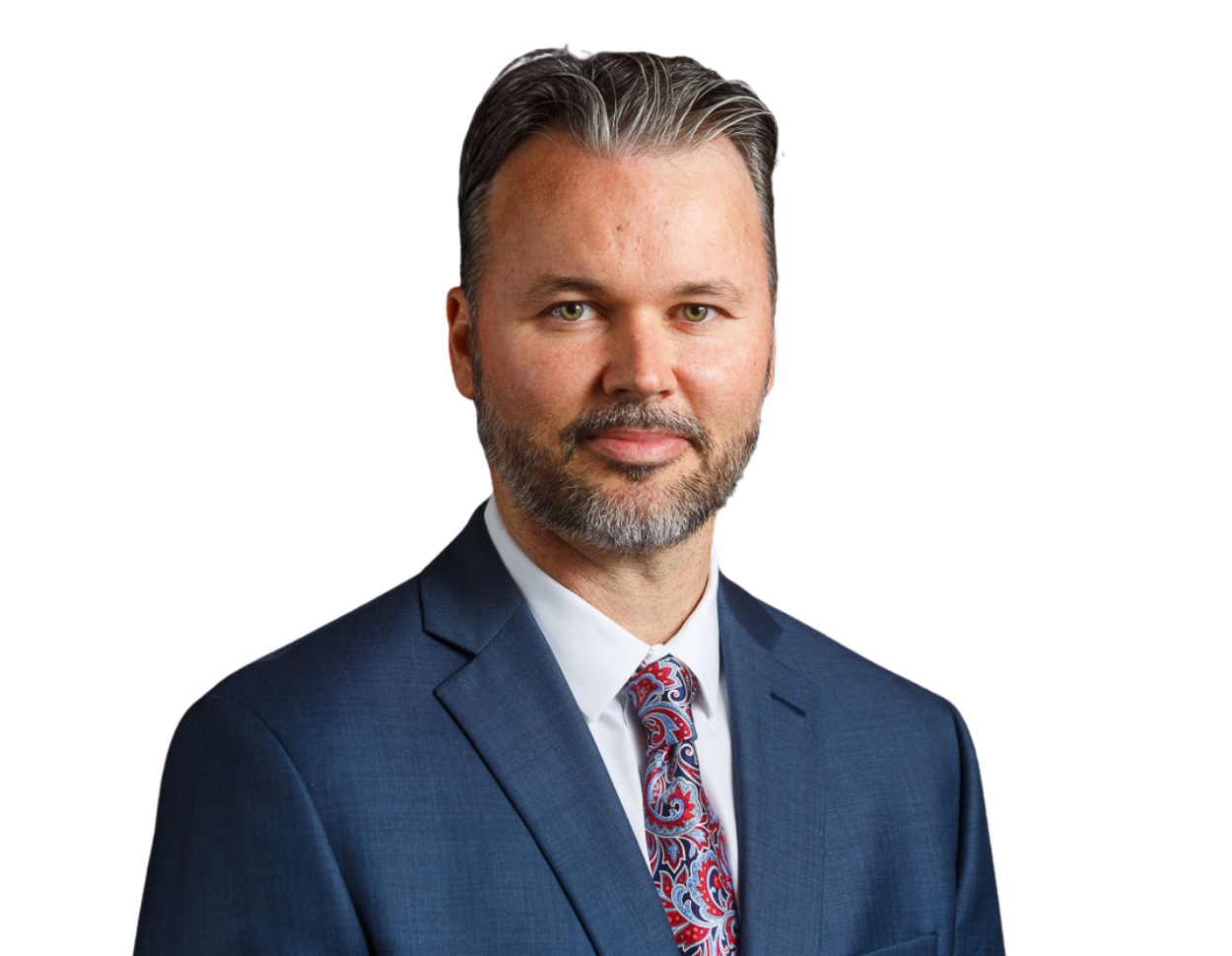 Scott Southerland in a blue suit and patterned tie.