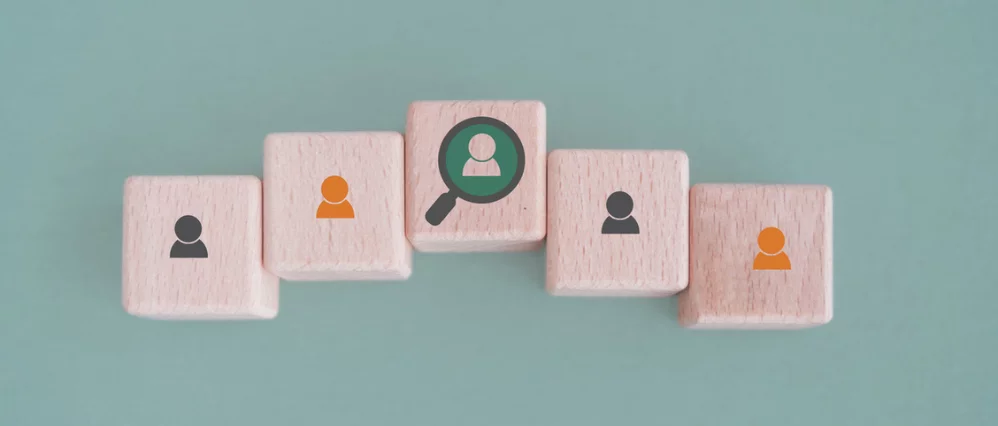 For buyer persona and target customer concept. Customer psychology profile ,characteristics. Personalized marketing and customer analysis. Wooden cube blocks with buyer persona