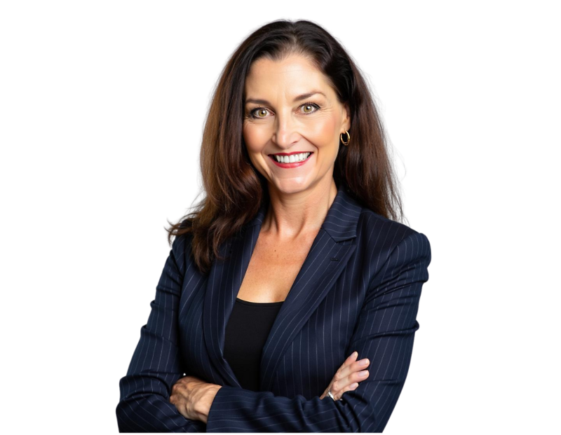 Professional of Jackie Johnson wearing a navy pinstripe blazer and black top, smiling confidently with arms crossed. She stands against a transparent background, giving a polished and approachable look suitable for business or leadership contexts