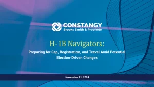 Constangy Brooks Smith & Prophete webinar title slide. Background with abstract blue and purple hues and curved architectural lines. The text reads: ‘H-1B Navigators: Preparing for Cap, Registration, and Travel Amid Potential Election-Driven Changes.’ A d