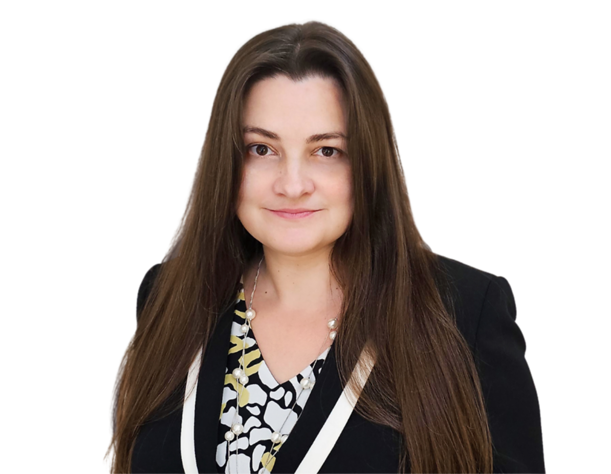 Rebecca Eng, smiling, wearing a black blazer over a patterned blouse with pearl accents against a plain background.
