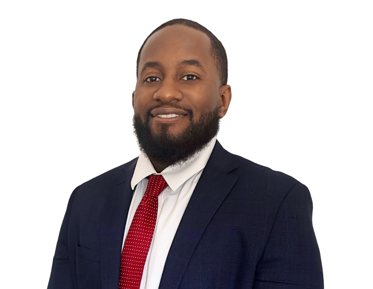 Smiling man with a short beard wearing a dark navy suit, white dress shirt, and red tie with small white dots, posing against a transparent background. He presents a polished and approachable business professional look.