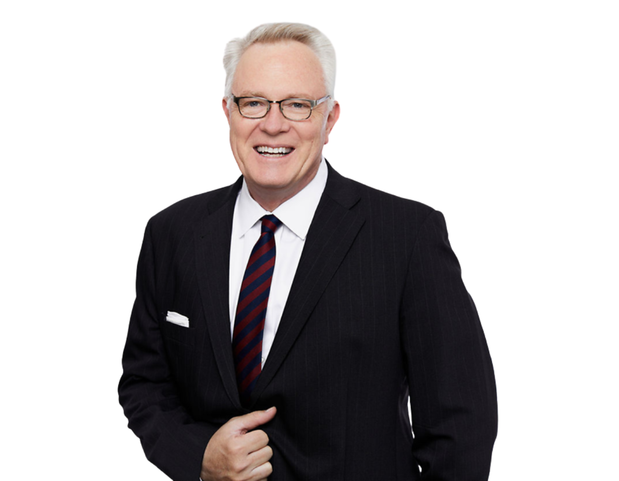 Terry Higham smiling in a dark pinstripe suit with a white shirt and red-and-navy striped tie, wearing glasses and standing against a transparent background in a professional headshot.