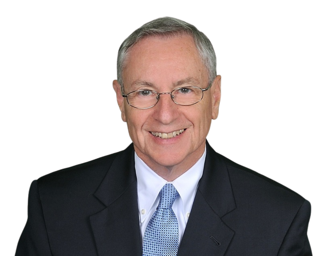 Professional older man with short gray hair and glasses, smiling in a dark suit, white shirt, and light blue tie.