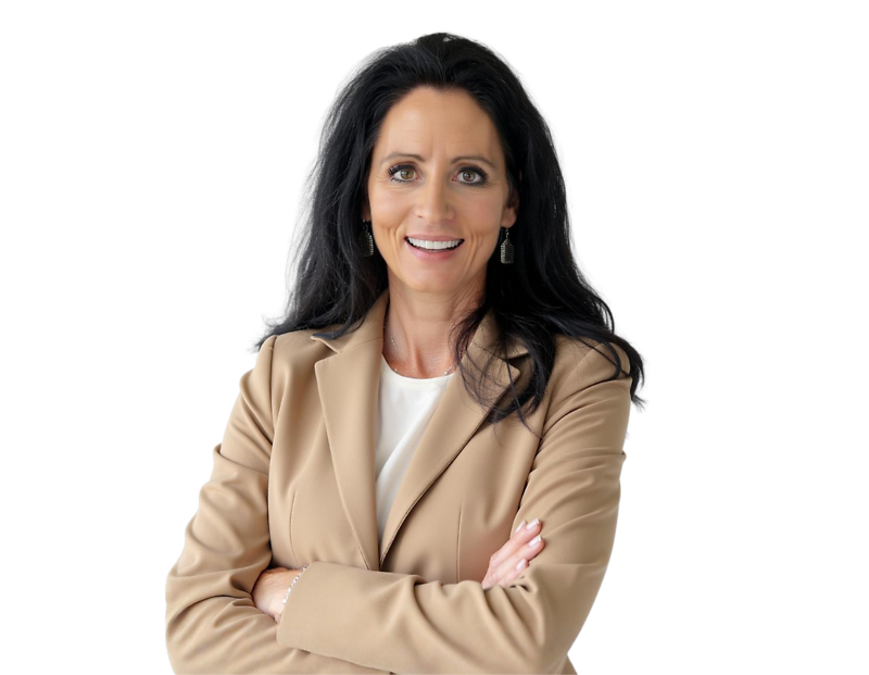 Professional headshot of Teresa Bult, a woman with long dark hair wearing a tan blazer over a white top, smiling confidently with arms crossed. The background is removed for a clean, transparent look.