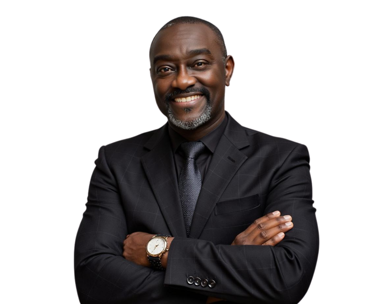 Professional headshot of Carl McCalla smiling slightly, wearing a dark pinstripe suit, white dress shirt, and a patterned blue tie.