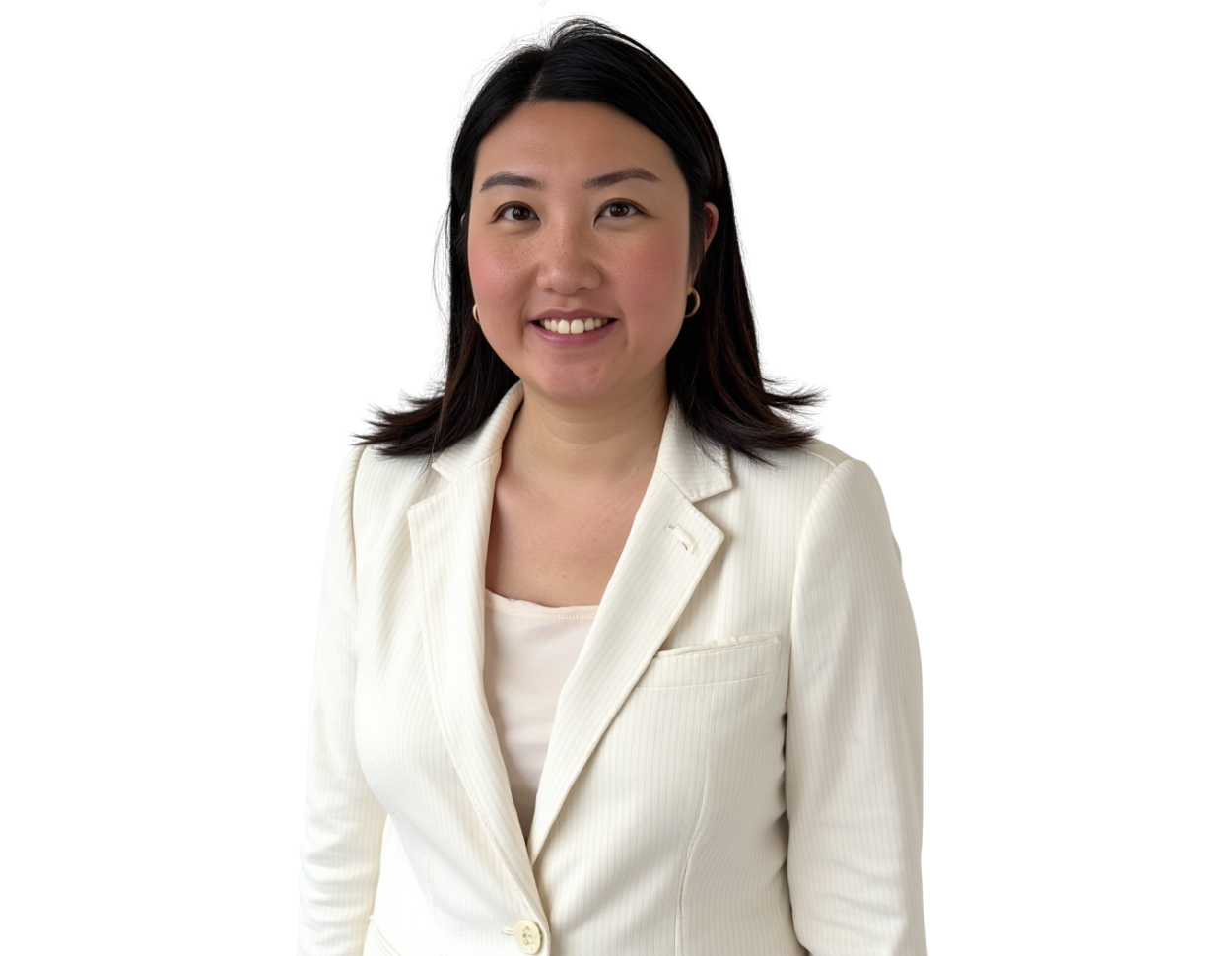 Smiling professional woman with shoulder-length dark hair wearing a textured white blazer over a light top, posing against a transparent background. She has a warm, approachable expression and a polished appearance suitable for business or corporate profi