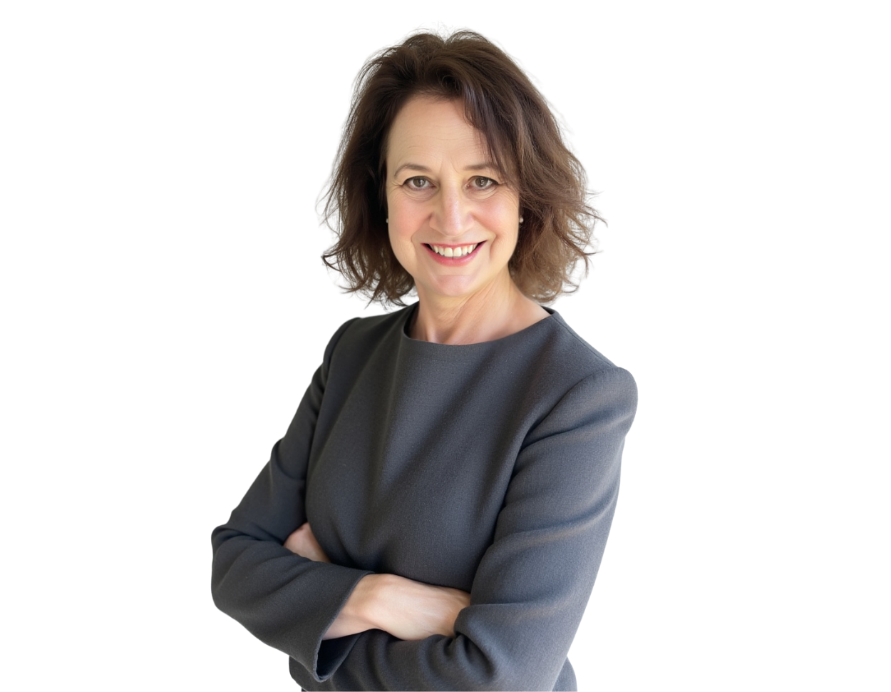 A professional portrait of a woman with shoulder-length brown hair styled in soft waves. She is smiling directly at the camera and wearing a long-sleeved dark gray dress. Her arms are crossed in a confident, approachable pose.