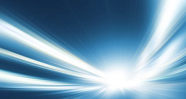 Abstract digital illustration of bright white and blue light beams radiating from a central point, creating a sense of speed and motion. The streaks blend into deep blue tones, giving the impression of traveling quickly through space or energy waves.