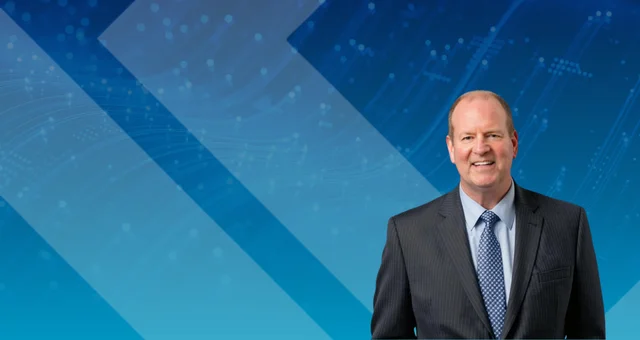 Promotional graphic for "Cyber Heroes. Behind the Firewall, featuring Sean Hoar in a black suit against a blue digital background.