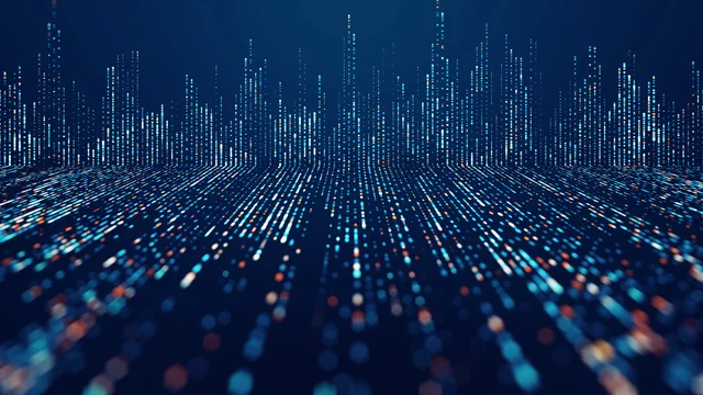 Abstract digital landscape of glowing blue and orange dots forming vertical lines, resembling a futuristic city skyline or data visualization. The perspective creates depth, symbolizing big data, analytics, and advanced technology.