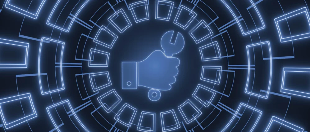 Glowing blue 3D illustration of a hand holding a wrench at the center of circular digital interface elements. Concentric rings and rectangular panels radiate outward, creating a futuristic technology dashboard effect.