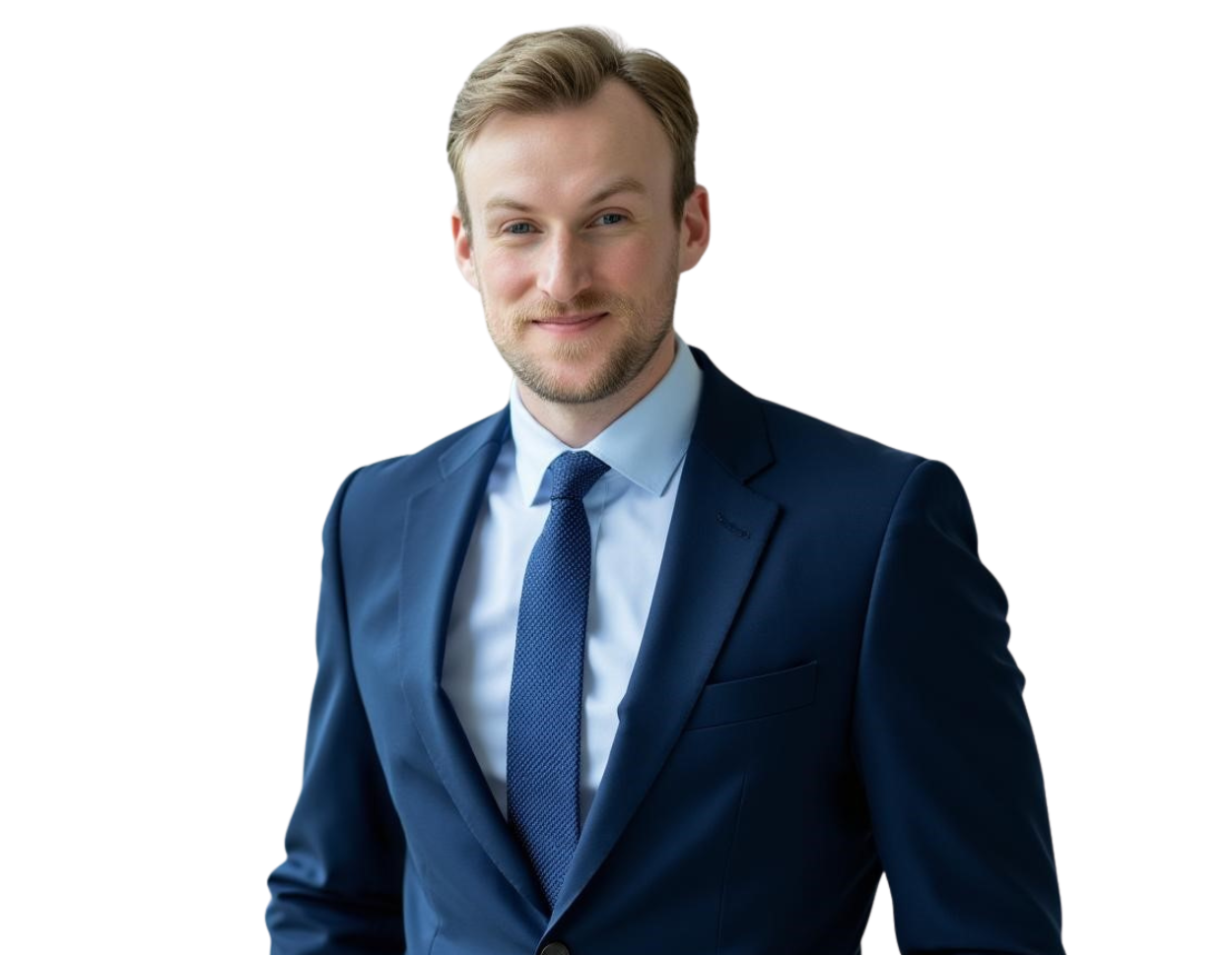 Photo of Craig Steen, wearing a navy blue suit with a light blue shirt and matching tie. He stands confidently against a transparent background, presenting a polished and approachable business image.