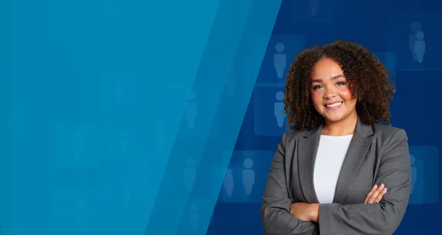 Katrice Curls smiles with her arms crossed while wearing a gray blazer and white top. She stands against a blue geometric background with subtle people icons.