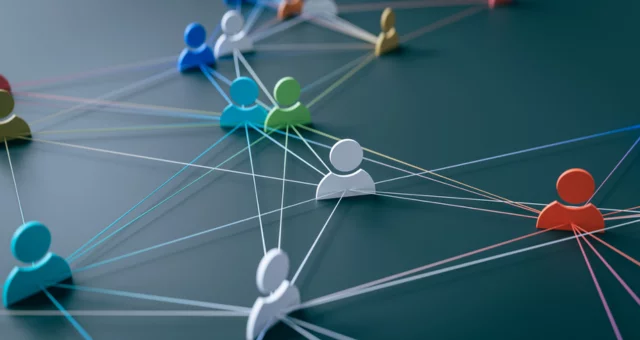 3D illustration of colorful human icons connected by thin lines across a dark surface, representing a network of relationships or communication. The arrangement symbolizes collaboration, teamwork, and interconnected digital or social systems.