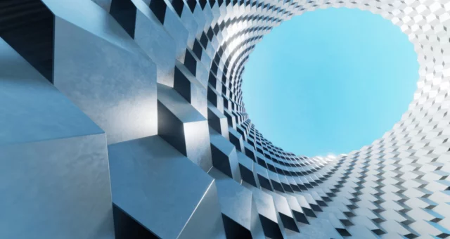 Abstract architectural structure with a twisting cylindrical design made of interlocking metallic cubes, opening upward to reveal a bright blue sky. The perspective emphasizes depth, symmetry, and modern geometric aesthetics.