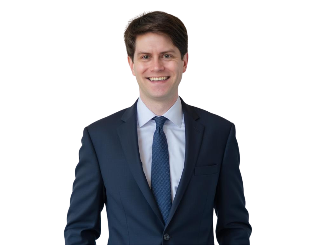 Matthew Clark, a labor and employment attorney, smiling in a navy blue suit with a patterned tie against a plain background. His professional appearance conveys approachability and expertise in workplace legal matters.