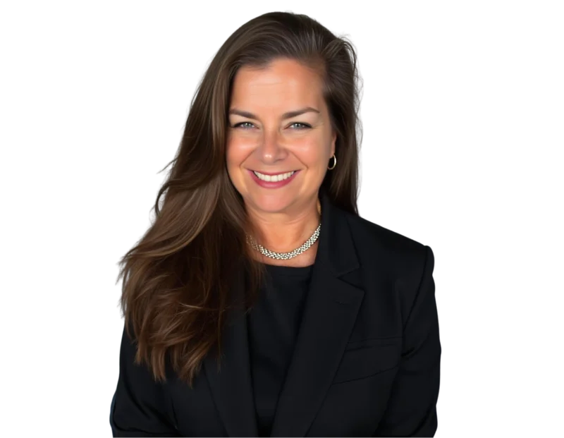Smiling professional photo of Lori Armstrong Halber with long brown hair wearing a black blazer over a black top, accessorized with a silver necklace and hoop earrings. She poses against a transparent background with a warm and confident expression suitab