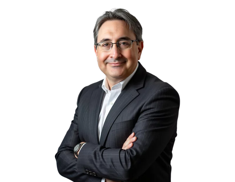 Jason Burk smiles while wearing a dark pinstripe suit over a white dress shirt. He stands against a transparent background with arms crossed, projecting professionalism and calm authority.