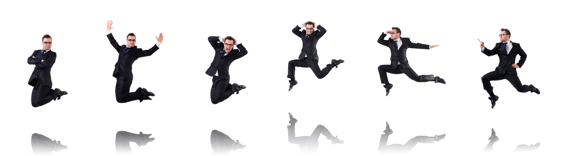 A man in a black business suit is captured in six different mid-air jumping poses, each showing exaggerated expressions and gestures. The white background and mirrored floor create a dynamic, playful sequence, highlighting energy, movement, and personality in a professional setting.