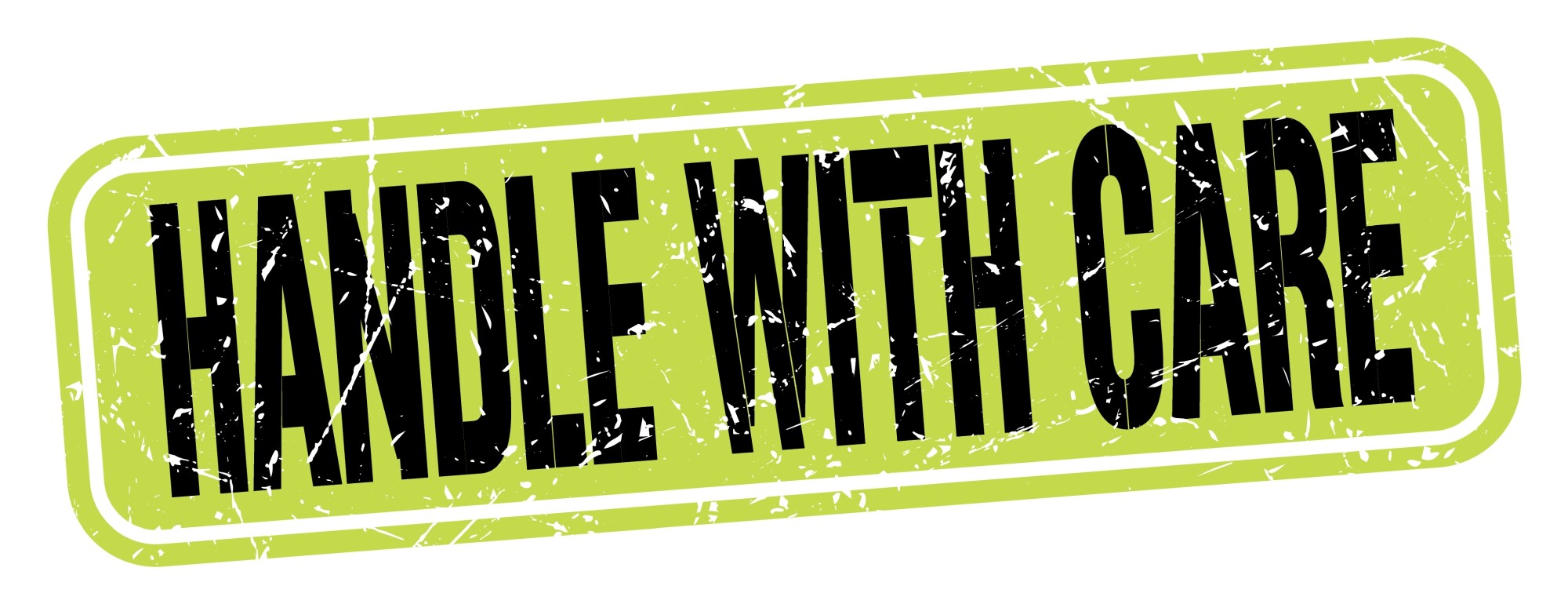 Grunge-style green rectangular label with distressed black text that reads “HANDLE WITH CARE” in all caps. The design mimics a shipping or fragile item warning sticker.