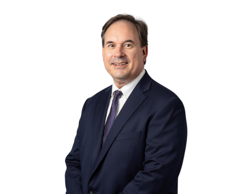 Ray Poole, labor and employment attorney in Jacksonville, Florida, wearing a navy suit and smiling.