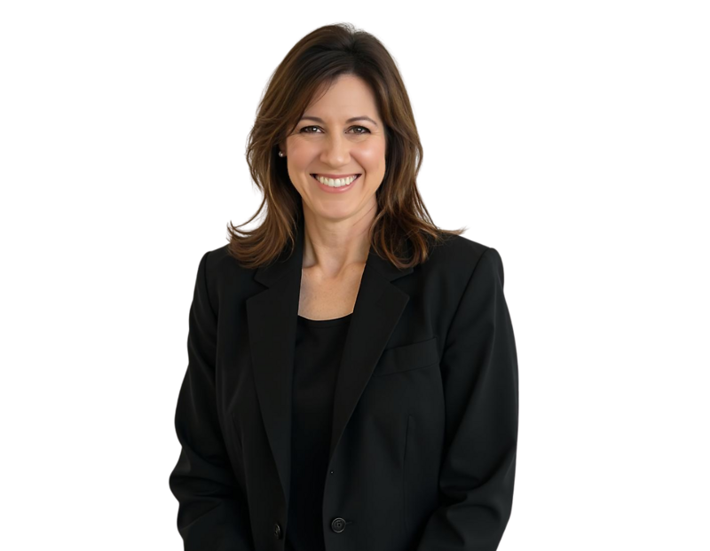 Angela Rapko wearing a black blazer and black top, posed against a light blue and white geometric background.