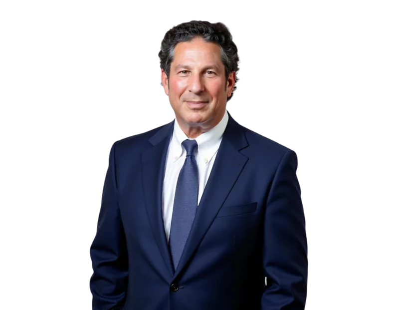 Headshot of Chairman, Neil Wasser, in a navy suit and blue tie.