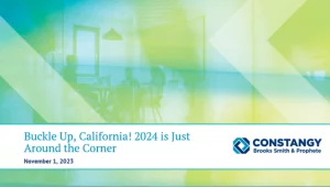 Constangy Brooks Smith & Prophete webinar slide titled 'Buckle Up, California! 2024 is Just Around the Corner,' dated November 1, 2023, with a green and yellow abstract office background showing people in a meeting.